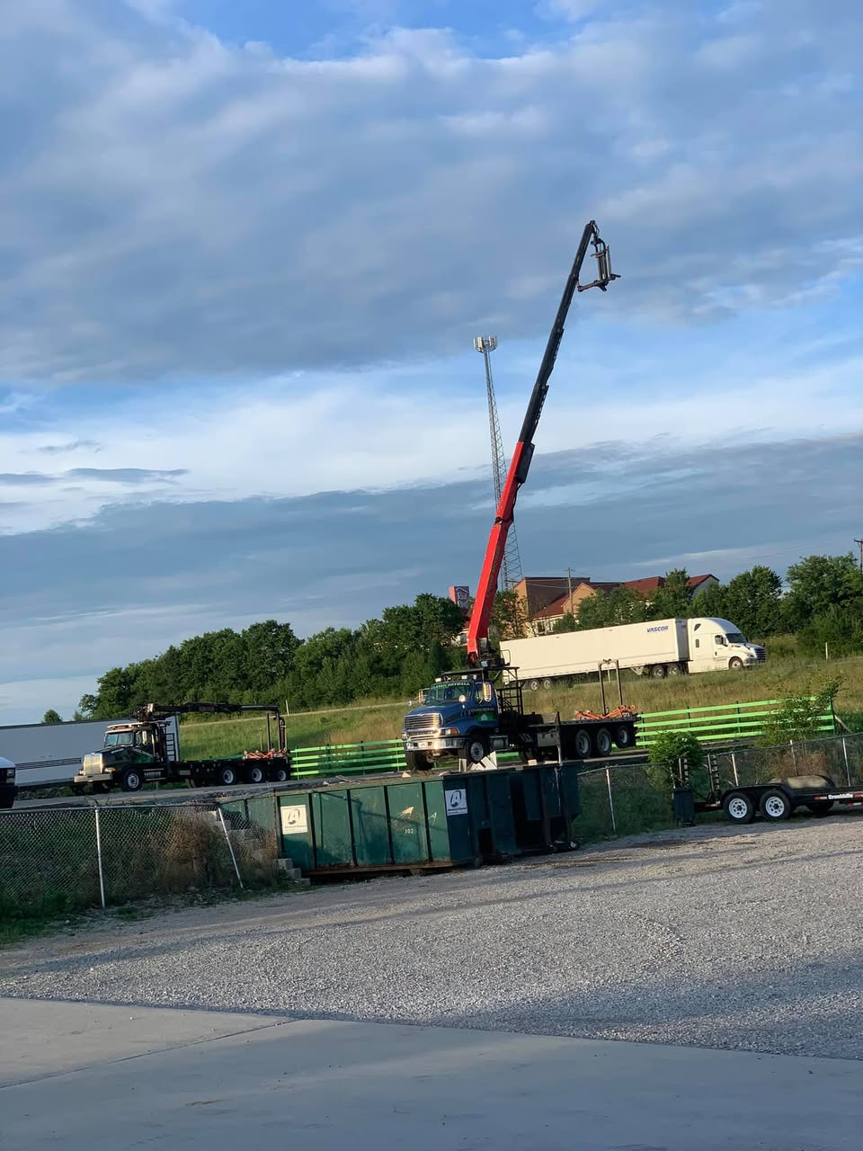 Boom truck delivering drywall